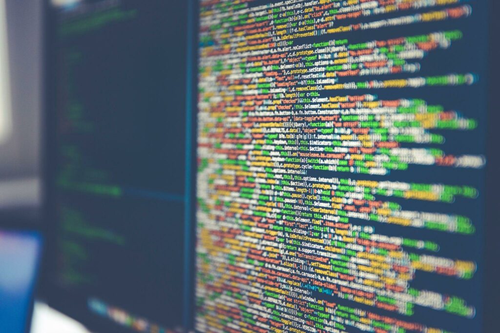 Are you Susceptible to These 5 Common Online Scams? - Computer Code